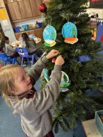 1st Class Decorating their Christmas Tree!